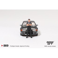 Mini GT Nissan Skyline Gt-R (R32) Nismo RHD con figura de Tsugio Matsuda Gunmetal Grey Escala 1/64 MGT00869rhd