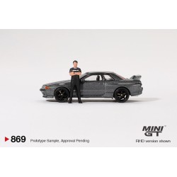 Mini GT Nissan Skyline Gt-R (R32) Nismo RHD con figura de Tsugio Matsuda Gunmetal Grey Escala 1/64 MGT00869rhd